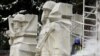 LITHUANIA – A worker starts to dismantle the Memorial of Red Army Soldiers at the Antakalnis Cemetery in Vilnius on December 6, 202